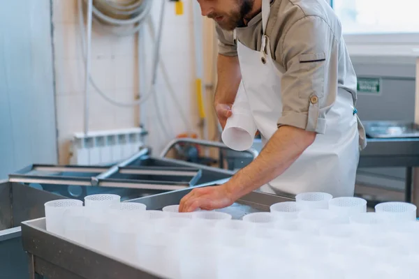 Cheese Maker Uniform Makes Cheese Puts Molds Pouring Cheese Production — Stock Photo, Image
