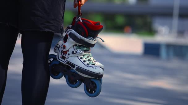 Young Hipster Girl Carries Roller Skates Starting Training Lesson Sports — Stock Video