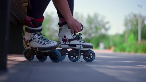 Young Hipster Girl Wearing Roller Skates Tying Laces Skate Park — Stock Video