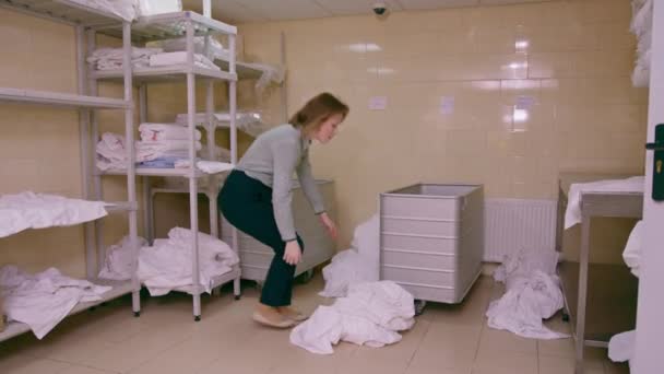 Industrial Laundry Hotel Dirty Bed Linen Lies Floor Housekeeping Worker — Stock Video