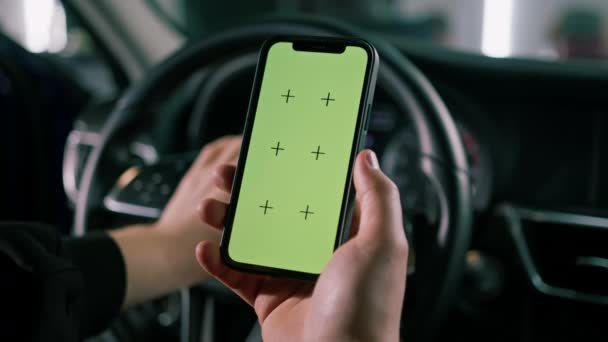Man Sits Luxury Car Green Screen Phone His Hands — Stock Video