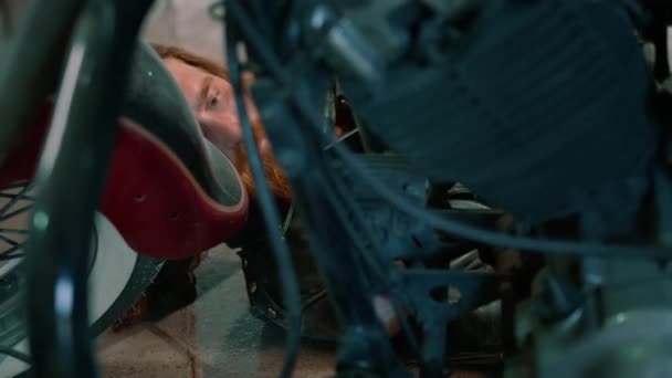 Creative Authentic Motorcycle Workshop Mechanic Biker Garage Repairing Motorcycle While — Stock Video