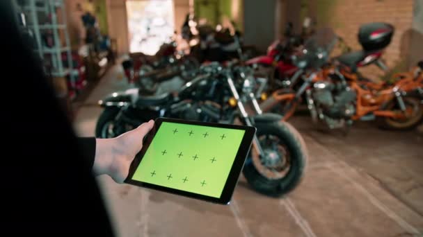 Creative Authentic Motorcycle Workshop Biker Mechanic Garage Standing Motorcycle Holding — Stock Video