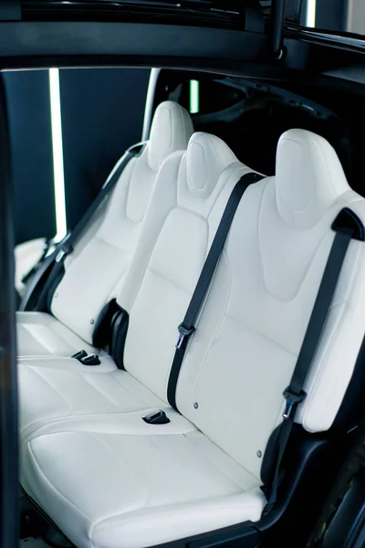 stock image Close-up of the seats of luxury sports car with a white interior after car detailing and dry cleaning