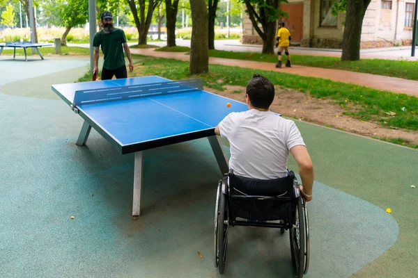 Inclusiveness Disabled Man Wheelchair Plays Ping Pong Old Man Gray — Stock Photo, Image