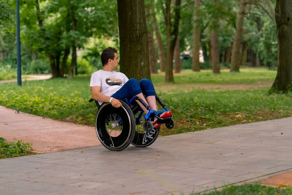 Inclusiveness Man Disability Does Wheelchair Stunts City Park Backdrop Trees — Stock Photo, Image