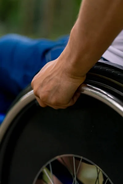 Inclusiveness Close Hand Man Disabilities Who Rides Wheelchair City Park — Stock Photo, Image