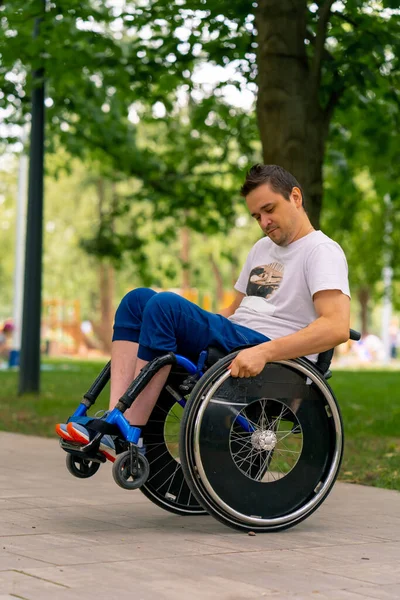 Inclusiveness Man Disability Does Wheelchair Stunts City Park Backdrop Trees — Stock Photo, Image