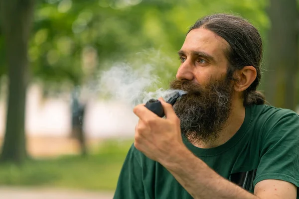 Portrait Aged Man Long Hair Gray Beard Smoking Pipe City — Stock Photo, Image
