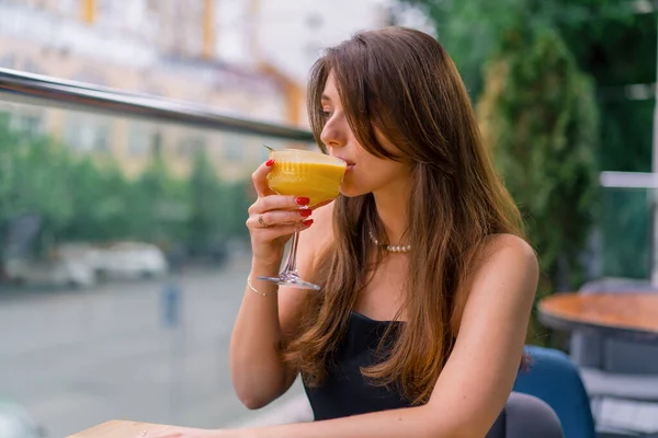 Young Smiling Girl Cocktail Her Hands Drinking Sitting Table Summer — Stock Photo, Image