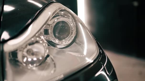 Car Wash Close Front Headlight Bumper Grille Black Luxury Car — Stock Video