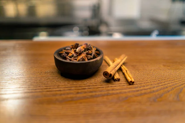 seasonings for food in a professional kitchen in a restaurant cinnamon sticks for serving