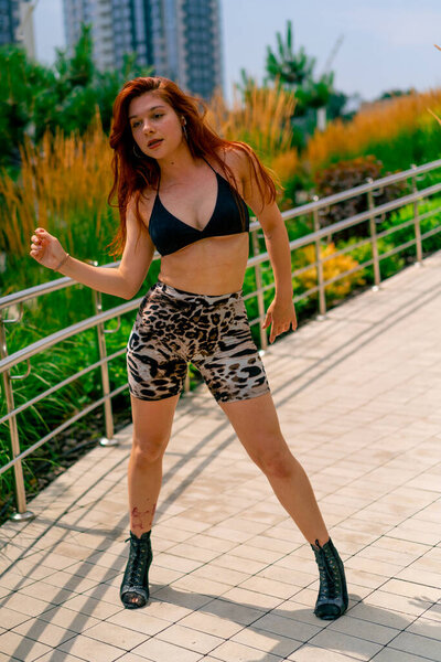 street dancing Sexy young fit woman in heels dancing heels on the street in city hobby active lifestyle seduction