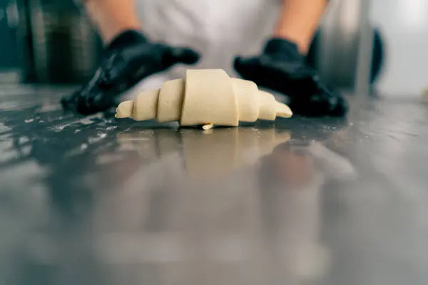 Close Chef Gloved Hands Shaping Twisting Raw Dough Shape Croissants — Stock Photo, Image