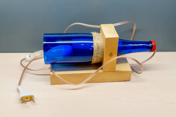 Decorative Lamp Made Form Broken Glass Bottle Wooden Shelf Manual — Stock Photo, Image