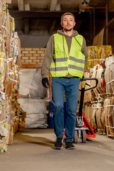 Worker Safety Vest Gloves Walks Hallway Hydraulic Pallet Truck Transporting — Stock Photo, Image