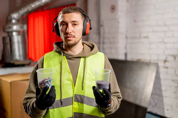 Portrait Man Uniform Headphones Holding Glasses Shredded Plastic Lids Recycling — Stock Photo, Image