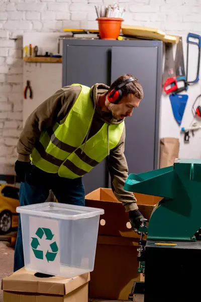 Waste Recycling Station Employee Wearing Noise Canceling Headphones Turns Special — Stock Photo, Image