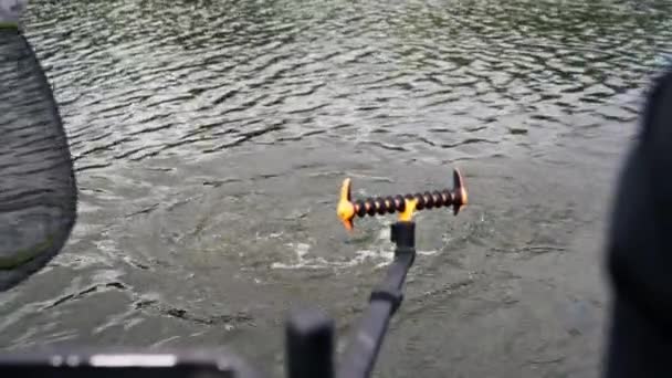 Close Fisherman Fishing Rod Spinning Professional Tools Pulling Fish Out — Stock Video