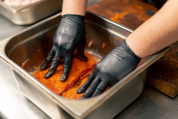 Close Professional Kitchen Chef Black Gloves Marinates Ribs Iron Bowl — Stock Photo, Image