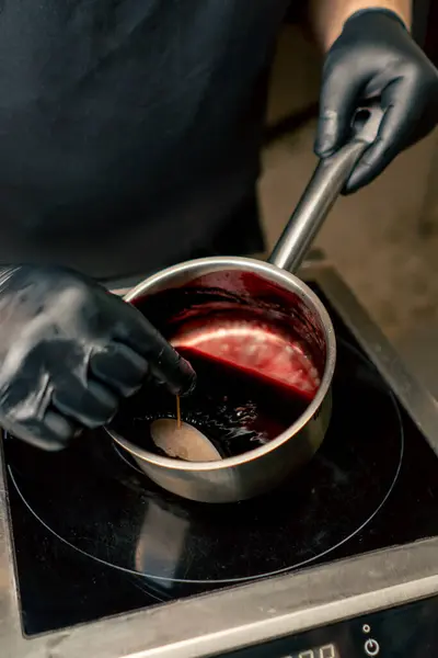 Close Professional Kitchen Chef Black Gloves Soaks Delicacy Burgundy Sauce — Stock Photo, Image