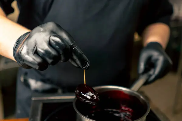 Close Professional Kitchen Chef Black Gloves Soaks Delicacy Burgundy Sauce — Stock Photo, Image