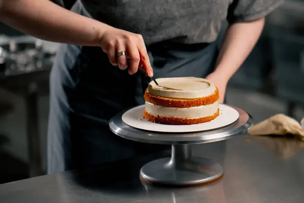 Close Female Baker Professional Kitchen Distributes Cream Sponge Cake Spatula — Stock Photo, Image