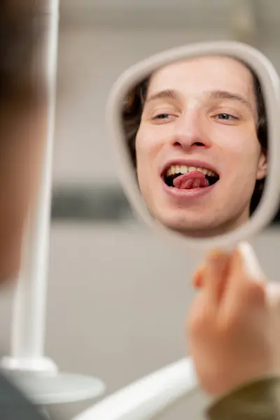Close Dental Office Young Guy Sits Looks His Teeth Dental — Stock Photo, Image