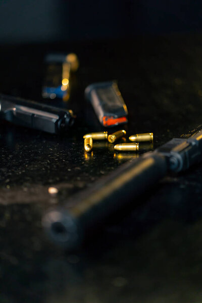 in a professional shooting range on black table gun shop professional equipment introductory briefing