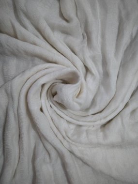 Arkaplan olarak beyaz kumaş spiral şekli