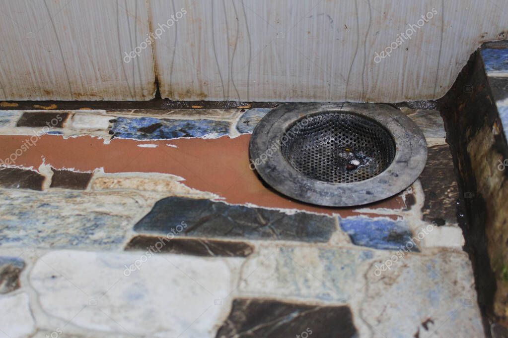 The drain in the bathroom