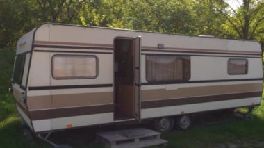 Showing around an open door travel trailer