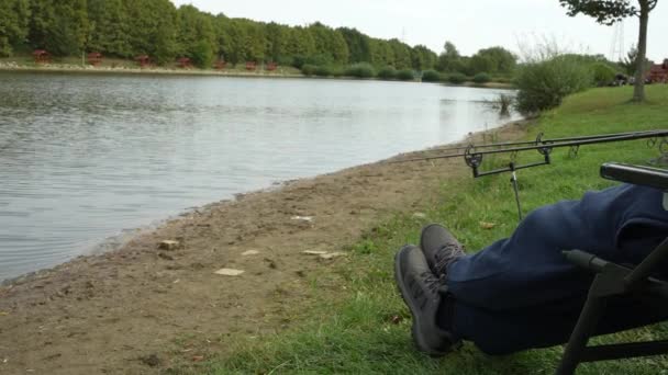 Anglers Legs Side Lake Waiting Fish — Vídeo de Stock
