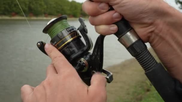 Angler Reeling Fish — Wideo stockowe