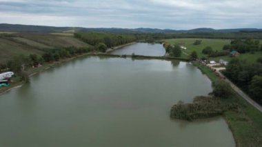 Showing around a commercial fishing lake