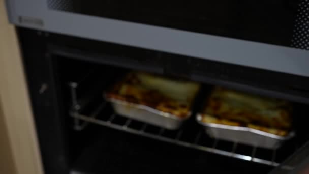 Opening Oven Revealing Lasagne Cooking — Stock Video