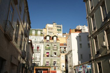 Tall mediterranean buildings with tile walls in Portugal