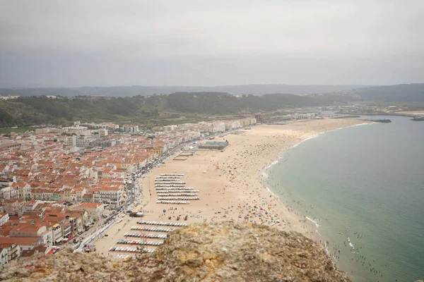 Overlooking a seaside town from a hill