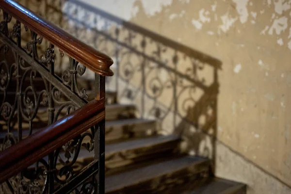 Bannister handrails in the stairwell of a building