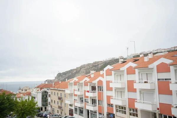 Mediterranean town block of flats leading to the sea shore