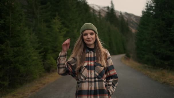 Young Female Traveller Walking Middle Epic Empty Road Mountains Surrounded — Videoclip de stoc