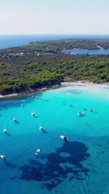 Aerial video of luxury super yacht marina and sailing boats. Modern water transport, summertime vacation, luxury lifestyle and wealth concept