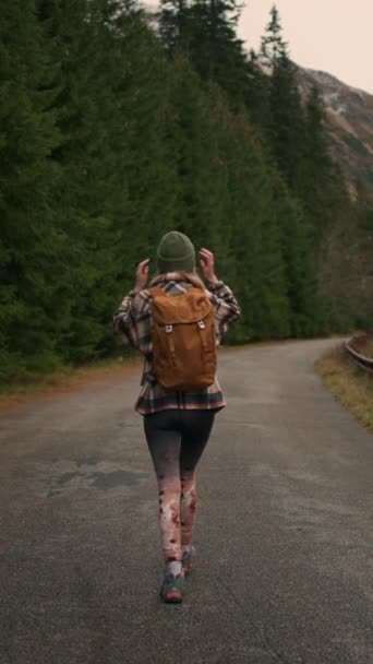 Back View Young Woman Traveller Walking Middle Empty Road Mountains — Stok video