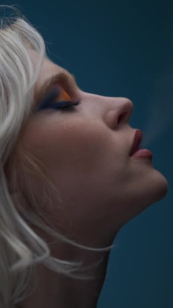 Blonde Beautiful Model Fabulous Makeup Smokes Electronic Cigarette Trendy Blue — Video Stock