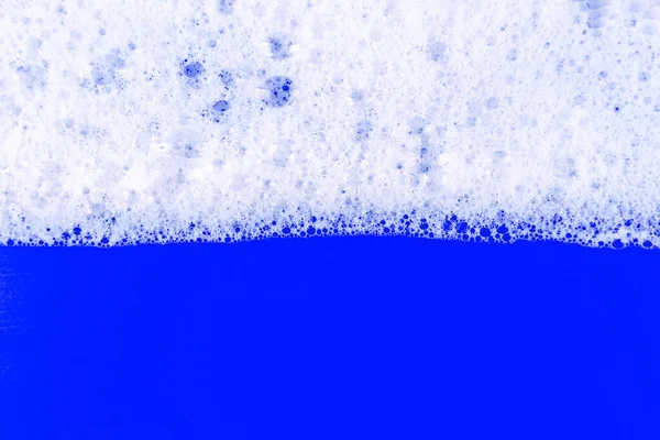 Foaming Liquid Blue Backdrop Cosmetics Foam Background Cosmetic Product Sample — 图库照片