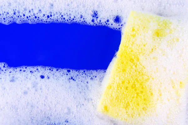 Cleaning Yellow Sponge Soapy Bubble Foam Blue Background Cleaning Concept — Zdjęcie stockowe