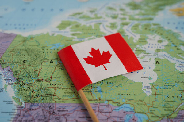 Bangkok, Thailand - May 15, 2022 Canada flag on world map