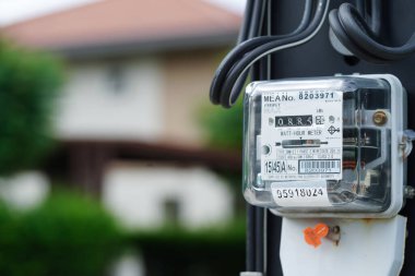 Bangkok, Thailand - May 15, 2022 Electric measuring power meter for energy cost at home and office.