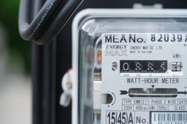 Bangkok, Thailand - May 15, 2022 Electric measuring power meter for energy cost at home and office.