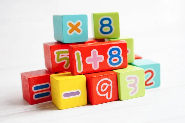 stock image Number wood block cubes for learning Mathematic, education math concept.